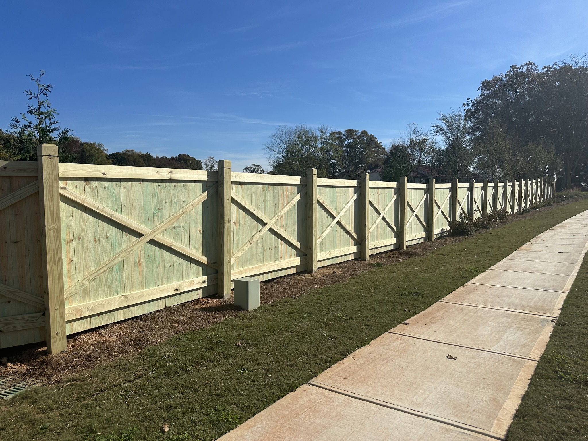 X style board on board fence installed in Canton, Georgia