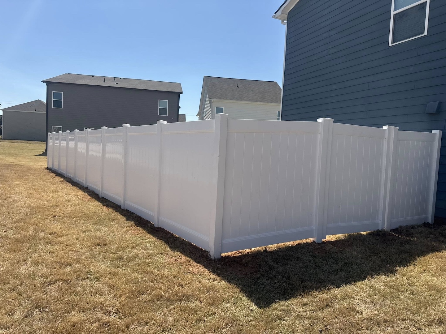 White vinyl privacy fence installation in Georgia